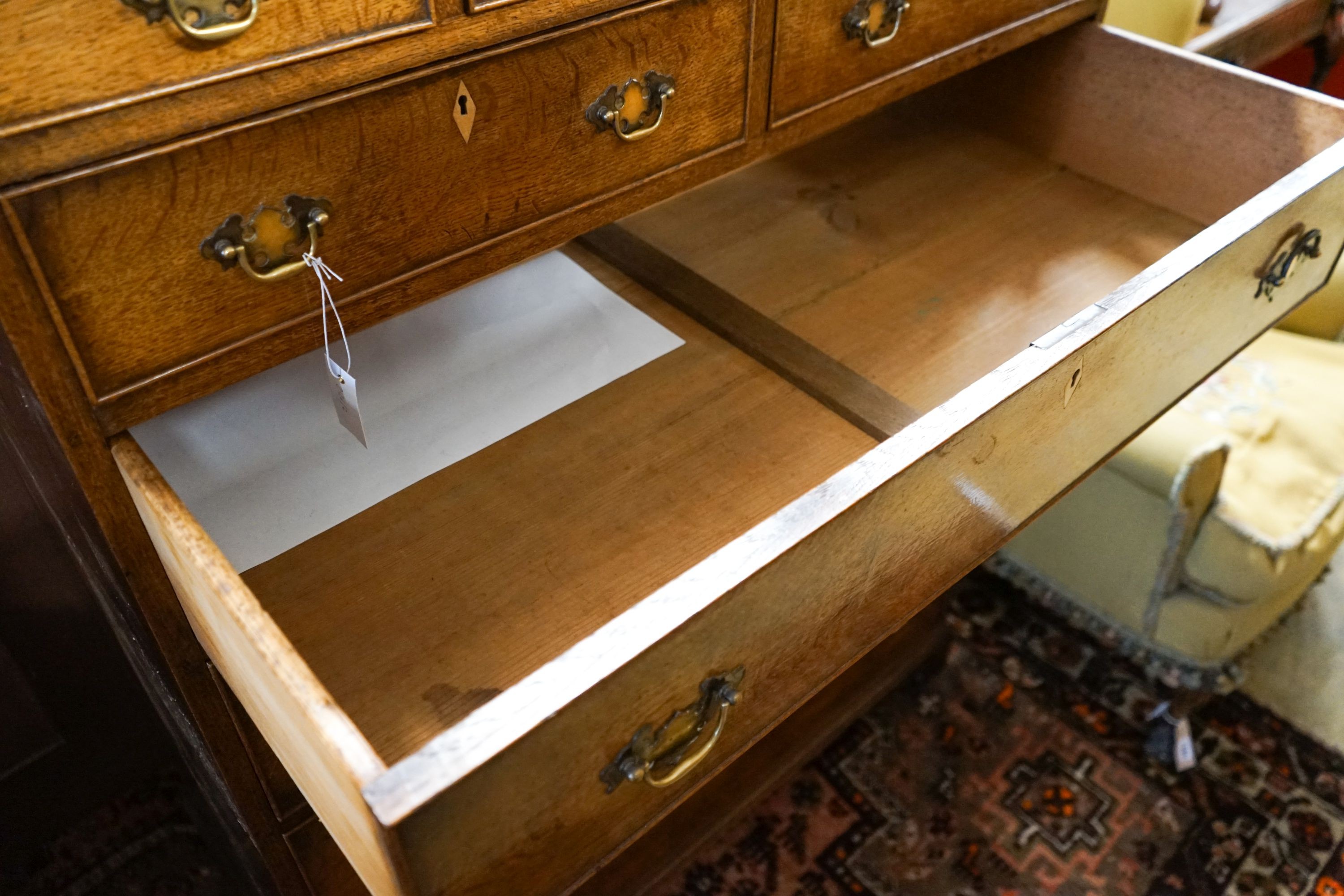 A George IV tall oak chest of drawers, width 107cm, depth 54cm, height 141cm